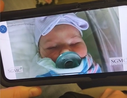 picture of baby on cell phone